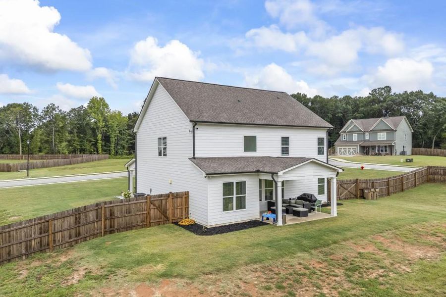 Front exterior of a new home in , Winder, GA, highlighting curb appeal (Image 26).