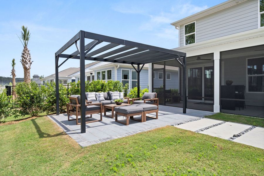 Exterior details and patio area of a home in Sun City Hilton Head, Bluffton (Image 30).