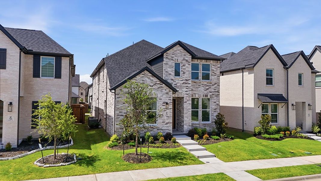 Front exterior of a new home in Light Farms Brenham - 40' Lots, Celina, TX, highlighting curb appeal (Image 23).