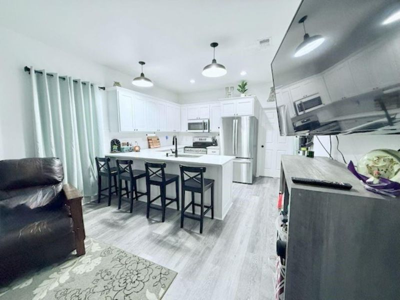 Furnished interior view inside a new home in , Brenham (Image 10).