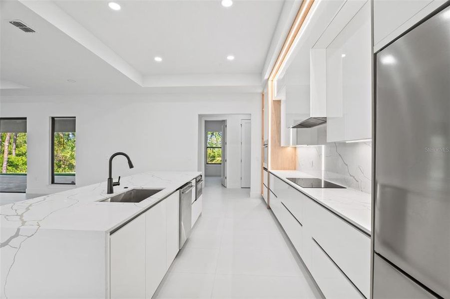 Furnished interior view inside a new home in , Malabar (Image 8).