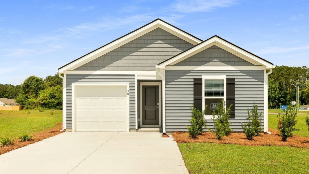 Front exterior of a new home in Evergreen, Holly Hill, SC, highlighting curb appeal (Image 1).