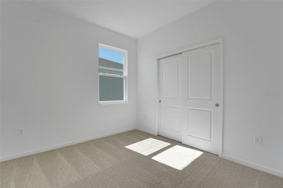 Spacious, unfurnished interior of a new home in Willowbrook North, Winter Haven (Image 29).