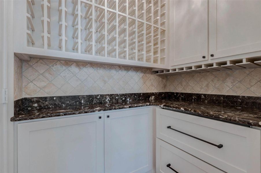 DRY BAR IN DINING WITH TWO REFRIGERATION DRAWERS & LARGE STORAGE CLOSET UNDER STAIRS