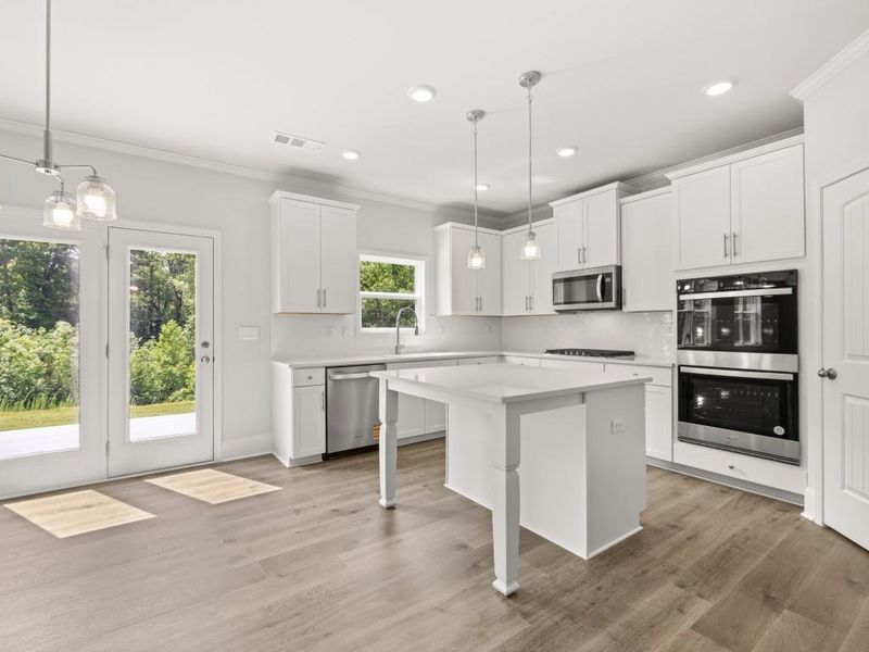 Furnished interior view inside a new home in Butner Estates, College Park (Image 14).