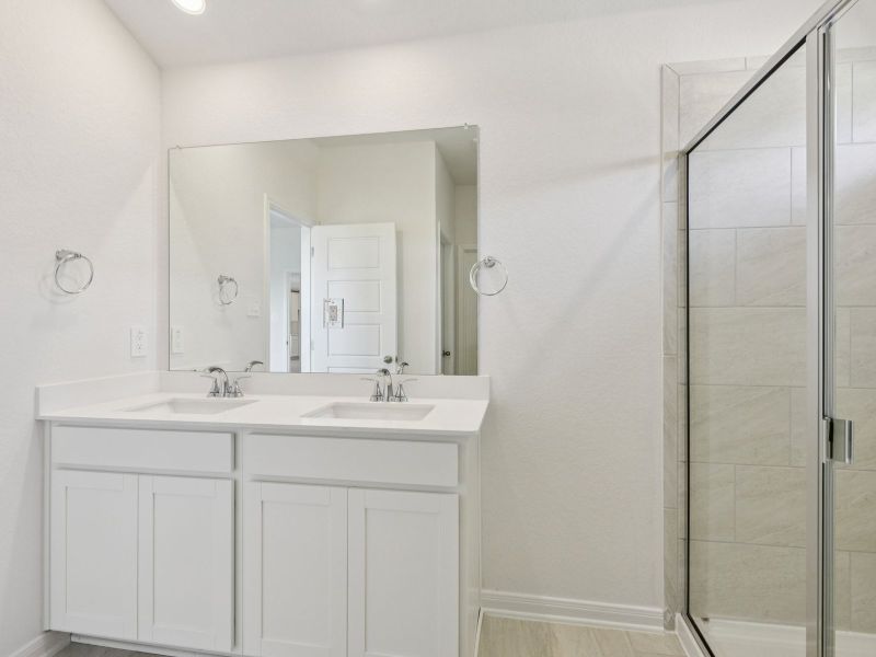 Primary suite bathroom in the Allen floorplan at a Meritage Homes community. Primary suite bathroom in the Allen floorplan at a Meritage Homes community.