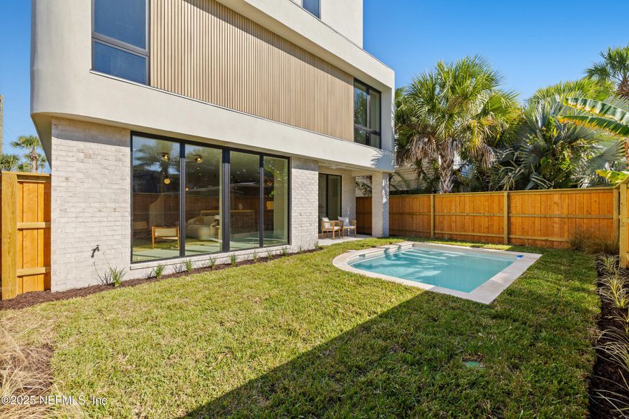 Exterior details and patio area of a home in , Atlantic Beach (Image 37).