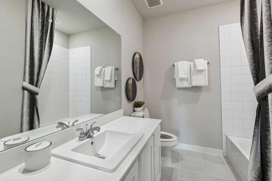 Bathroom in the Oak home plan by Trophy Signature Homes