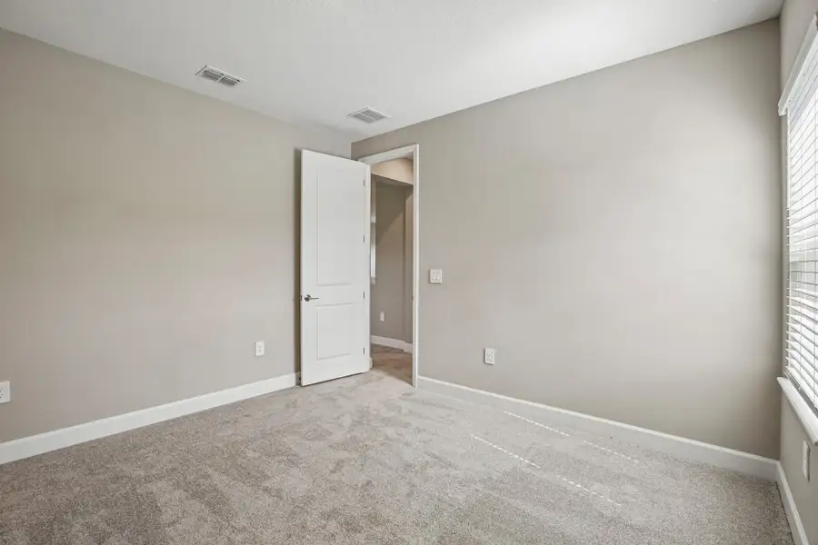Spacious, unfurnished interior of a new home in Firethorn, Parrish (Image 19).