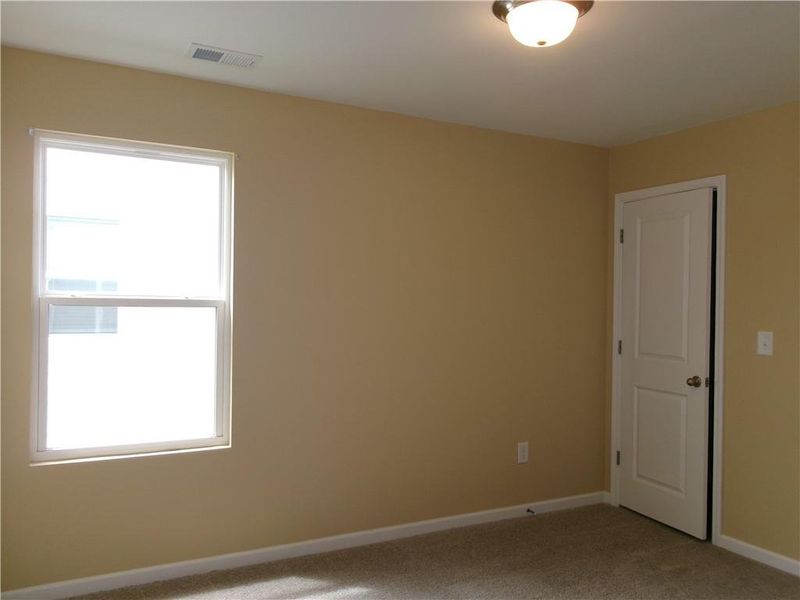 Spacious, unfurnished interior of a new home in Alder Park, Conyers (Image 11).