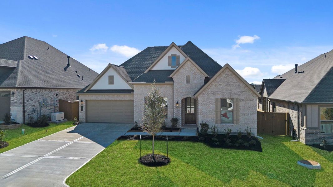 Front exterior of a new home in Chambers Creek, Willis, TX, highlighting curb appeal (Image 16).