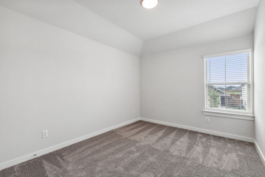 Bedroom in the Hickory home plan by Trophy Signature Homes – REPRESENTATIVE PHOTO