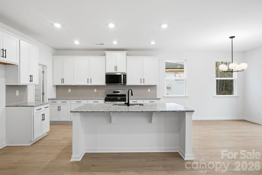 Furnished interior view inside a new home in Wellington Pointe Executive, Monroe (Image 29).