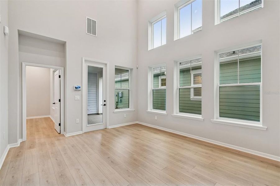 Spacious, unfurnished interior of a new home in Laureate Park at Lake Nona - Garden Series, Orlando (Image 28).