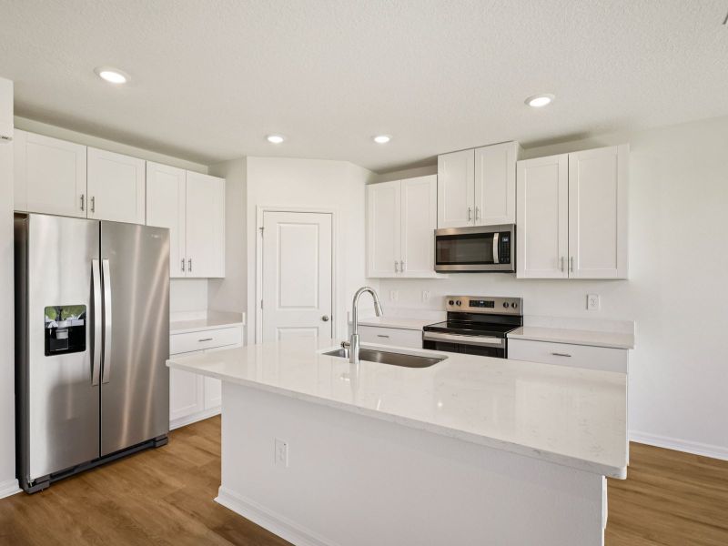 Furnished interior view inside a new home in Benton Hills - Classic Series, Brooksville (Image 5). Furnished interior view inside a new home in Benton Hills - Classic Series, Brooksville (Image 5).