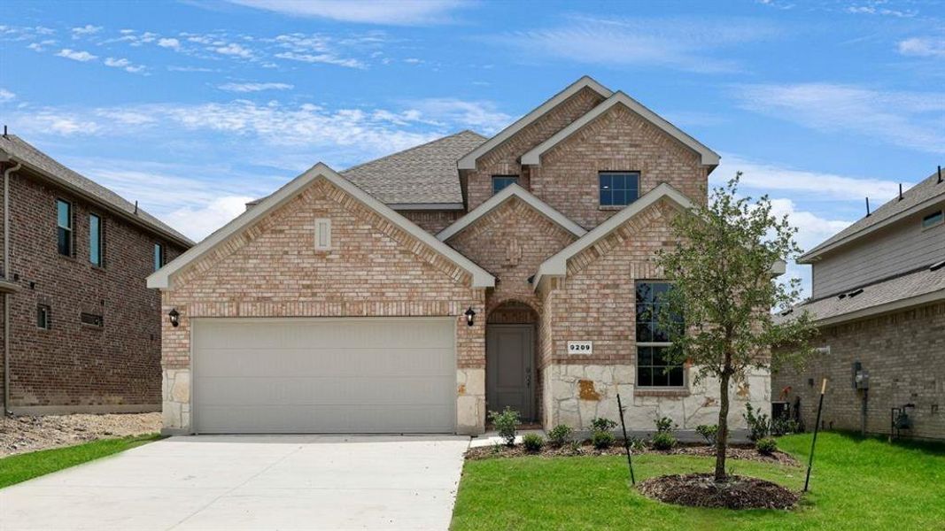 Front exterior of a new home in The Landing at Hidden Lakes, McKinney, TX, highlighting curb appeal (Image 1). Front exterior of a new home in The Landing at Hidden Lakes, McKinney, TX, highlighting curb appeal (Image 1).