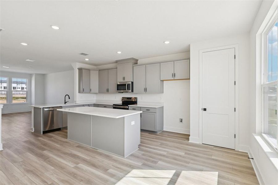 Furnished interior view inside a new home in Parkview at Hamlin, Winter Garden (Image 6). Furnished interior view inside a new home in Parkview at Hamlin, Winter Garden (Image 6).