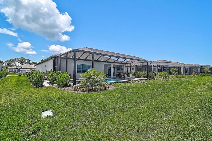 Front exterior of a new home in , Nokomis, FL, highlighting curb appeal (Image 21). Front exterior of a new home in , Nokomis, FL, highlighting curb appeal (Image 21).