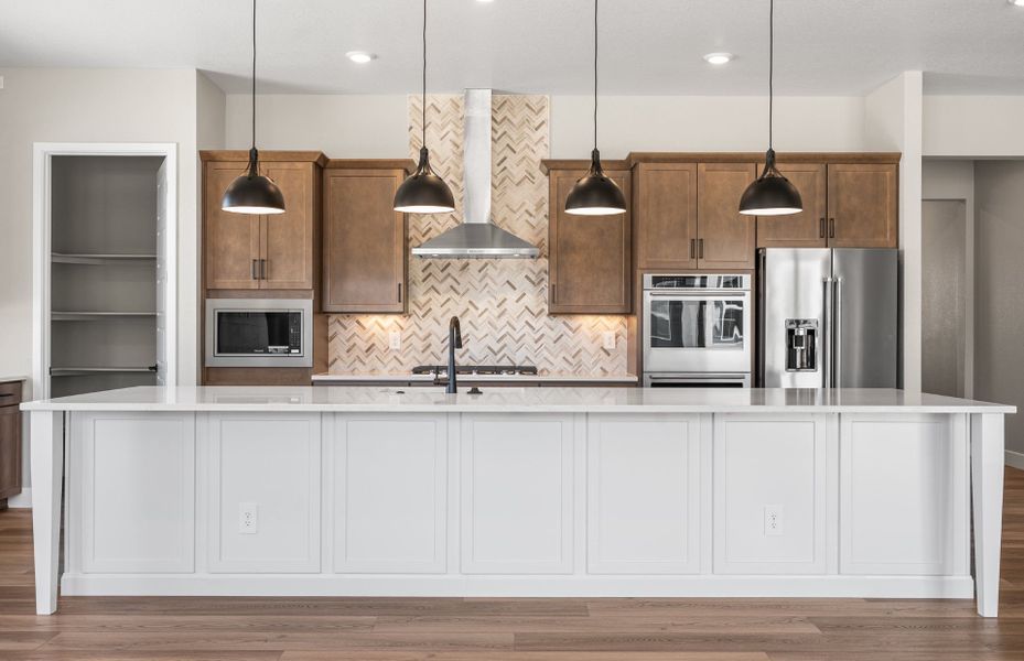 Furnished interior view inside a new home in Hilltop at Inspiration, Aurora (Image 16).