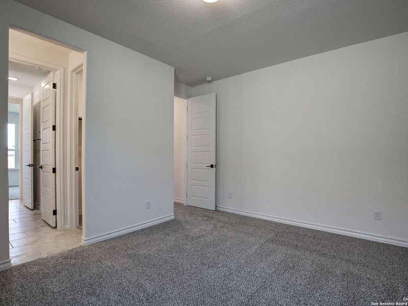 Spacious, unfurnished interior of a new home in The Reserve at Potranco Oaks, Castroville (Image 43).