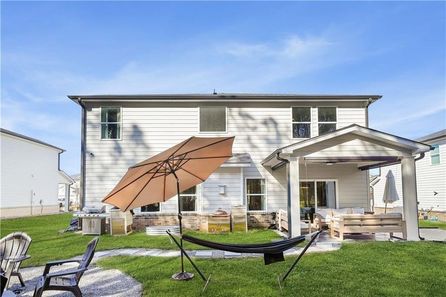 Exterior details and patio area of a home in , Loganville (Image 28).