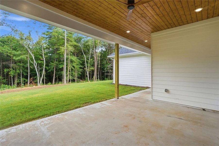 Exterior details and patio area of a home in , White (Image 34).