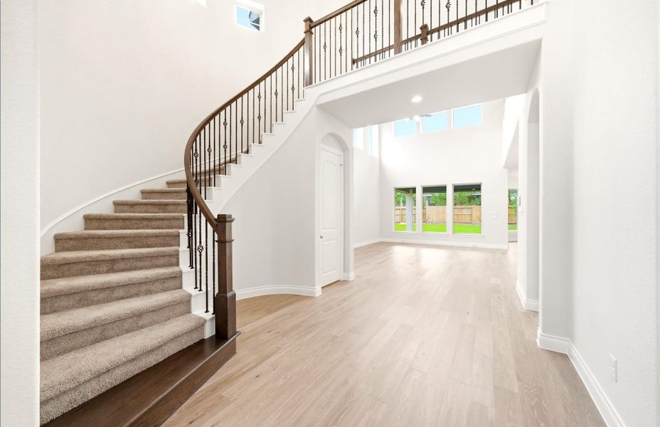 Spacious, unfurnished interior of a new home in The Woodlands Hills 65′, Willis (Image 33).