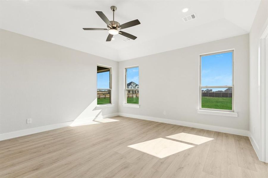 Unfurnished room featuring light wood finished floors, a ceiling fan, and recessed lighting Unfurnished room featuring light wood finished floors, a ceiling fan, and recessed lighting