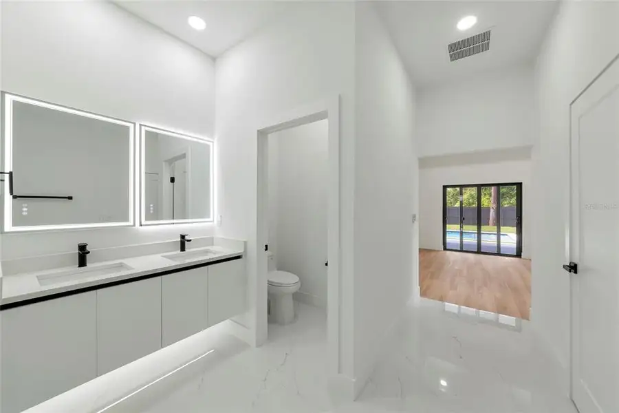 Furnished interior view inside a new home in , North Port (Image 8).