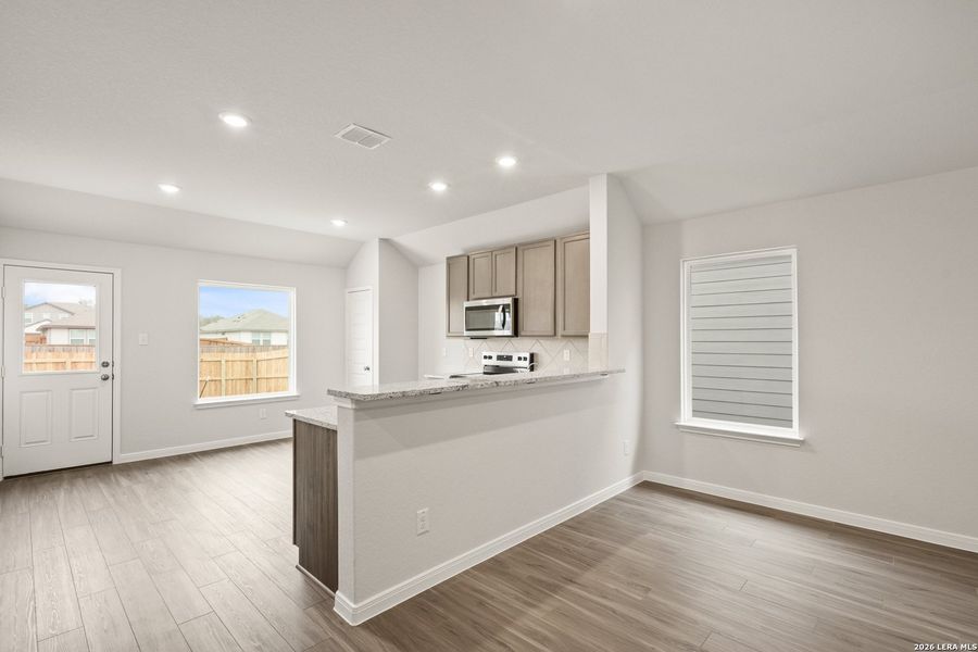 Furnished interior view inside a new home in Abbott Place, St. Hedwig (Image 6).