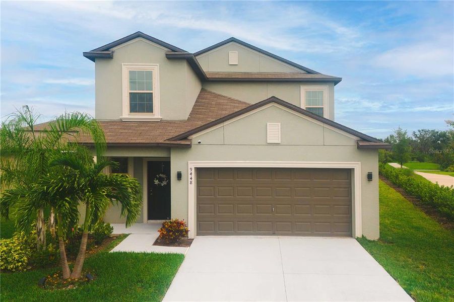 Front exterior of a new home in , Sun City Center, FL, highlighting curb appeal (Image 1). Front exterior of a new home in , Sun City Center, FL, highlighting curb appeal (Image 1).