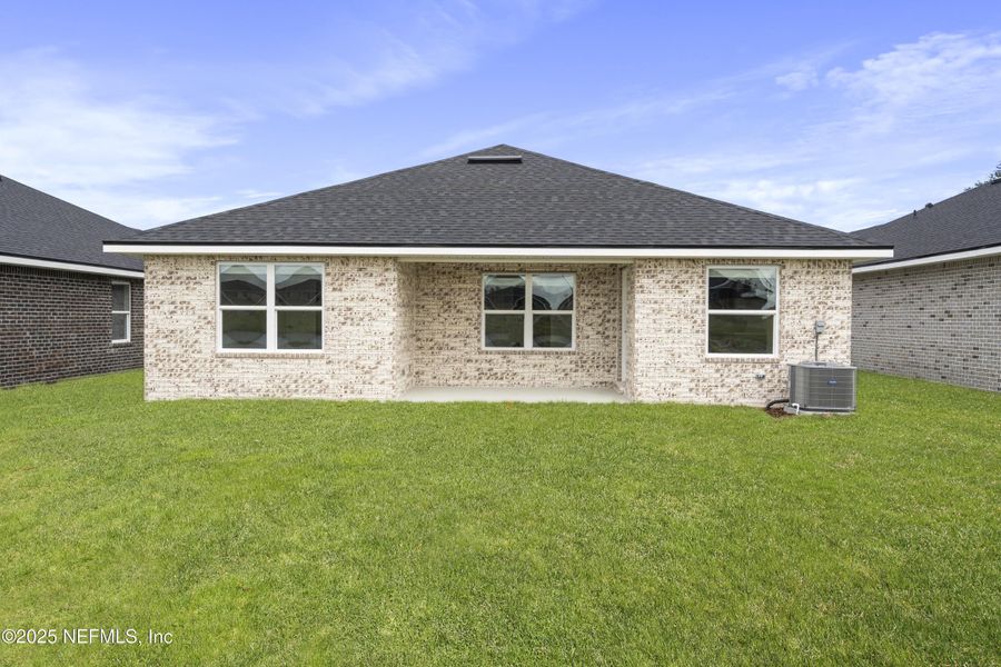 Exterior details and patio area of a home in Shadow Crest at Rolling Hills, Green Cove Springs (Image 1). Exterior details and patio area of a home in Shadow Crest at Rolling Hills, Green Cove Springs (Image 1).