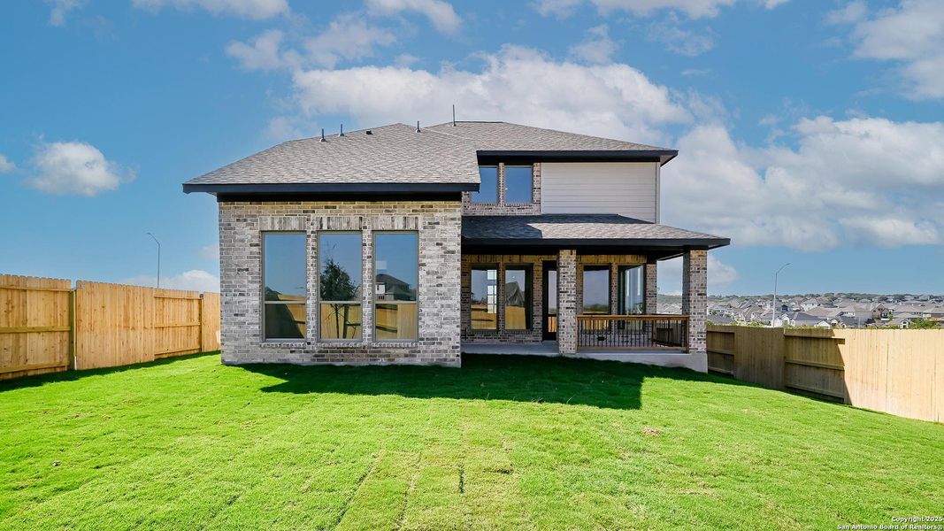 Exterior details and patio area of a home in Homestead 55', Schertz (Image 18).
