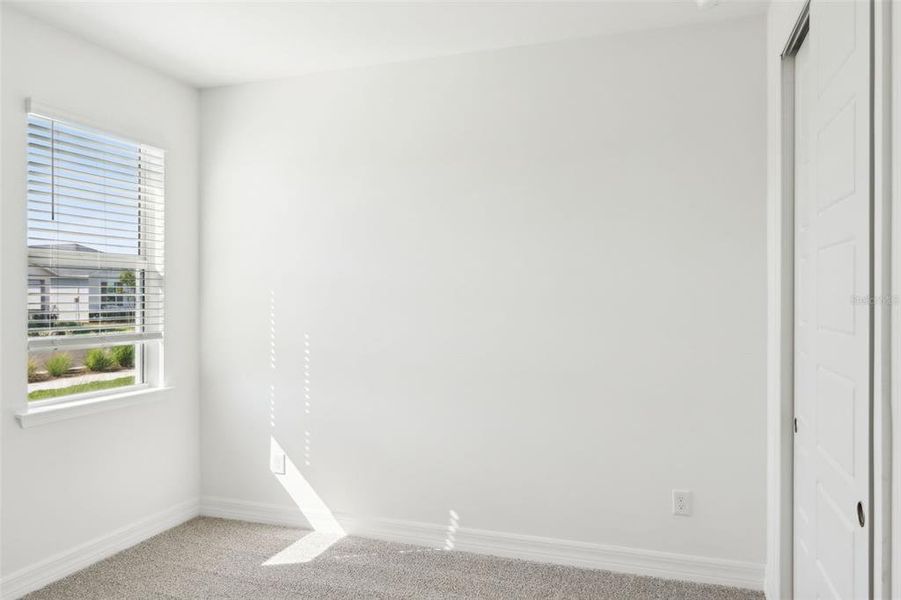 Spacious, unfurnished interior of a new home in Crescent Lakes - Reserve Series, Punta Gorda (Image 18). Spacious, unfurnished interior of a new home in Crescent Lakes - Reserve Series, Punta Gorda (Image 18).