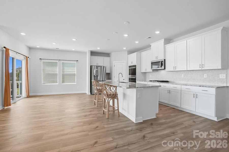 Furnished interior view inside a new home in Solena at the Vineyards II, Charlotte (Image 8).