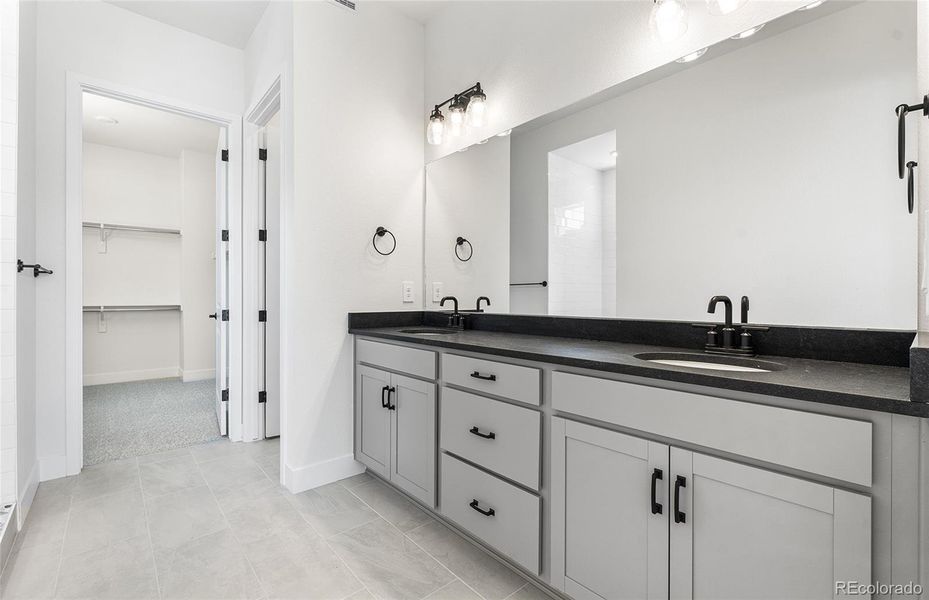 Furnished interior view inside a new home in Hilltop at Inspiration, Aurora (Image 7).