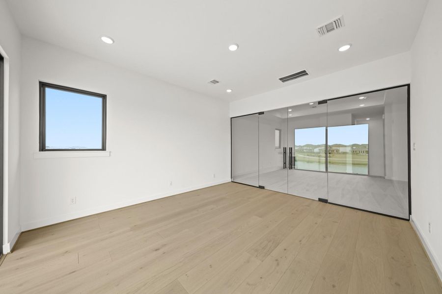 Spacious, unfurnished interior of a new home in Bridgeland, Cypress (Image 44).