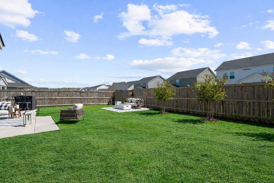 Exterior details and patio area of a home in Sweetgrass at Summers Corner, Summerville (Image 30).