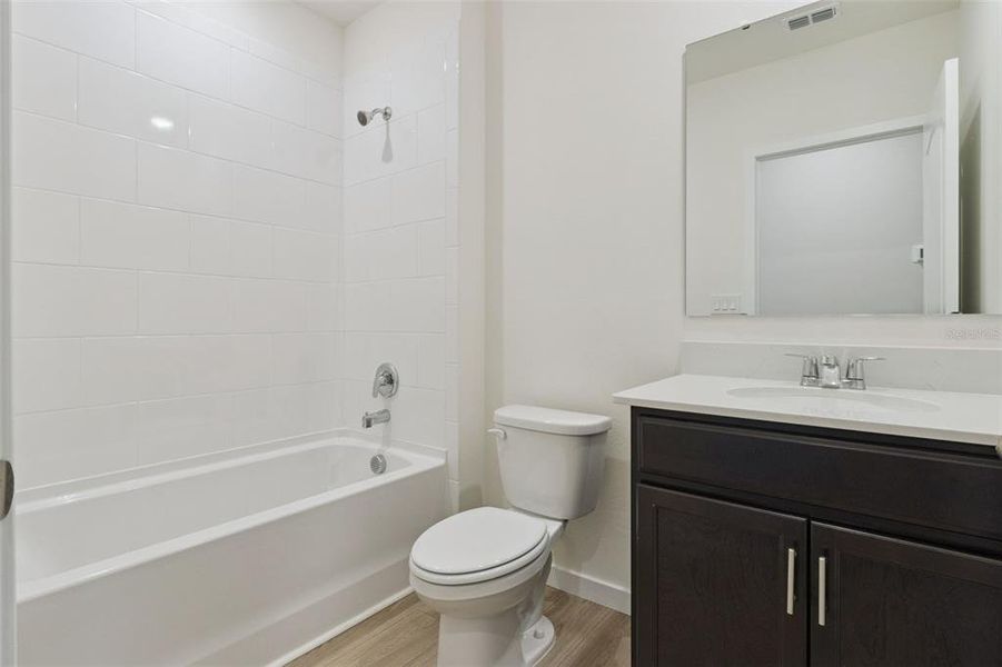 Furnished interior view inside a new home in , Kissimmee (Image 12).