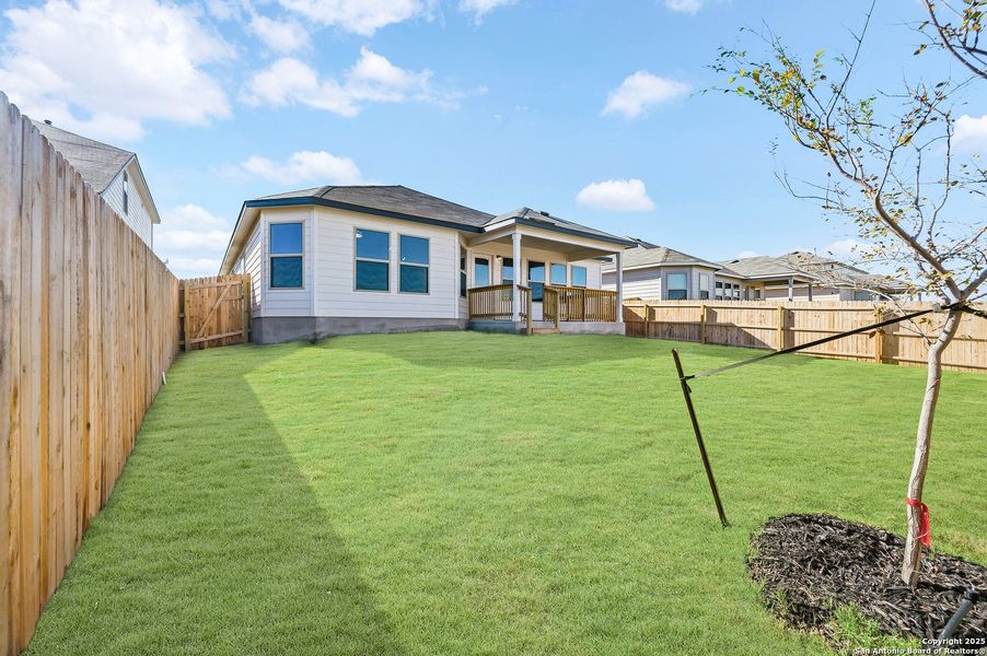 Exterior details and patio area of a home in Winding Brook, San Antonio (Image 23).