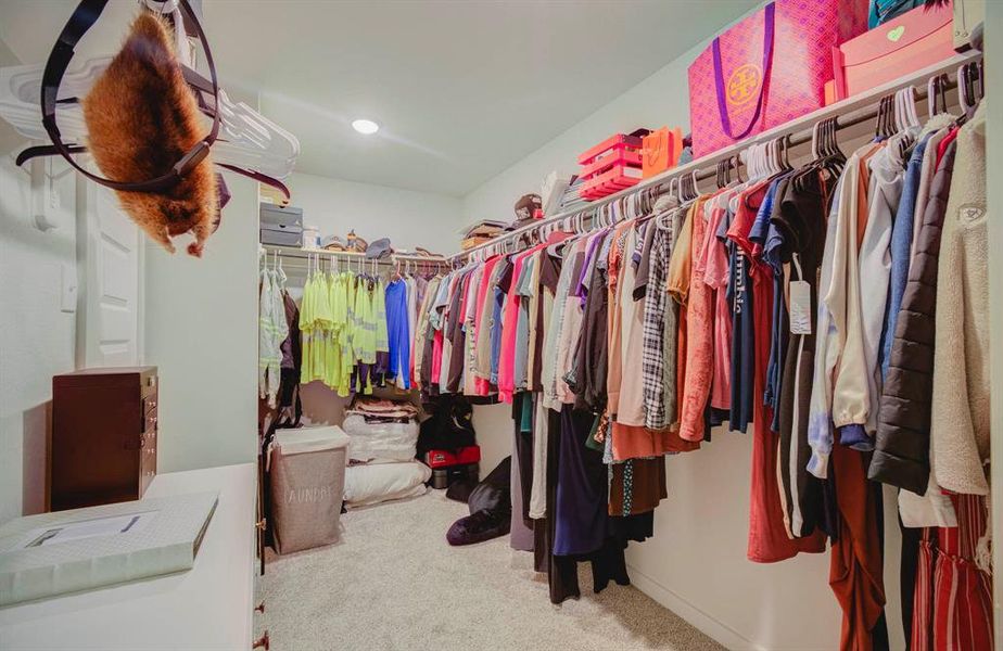 Large primary closet connected to the laundry room!