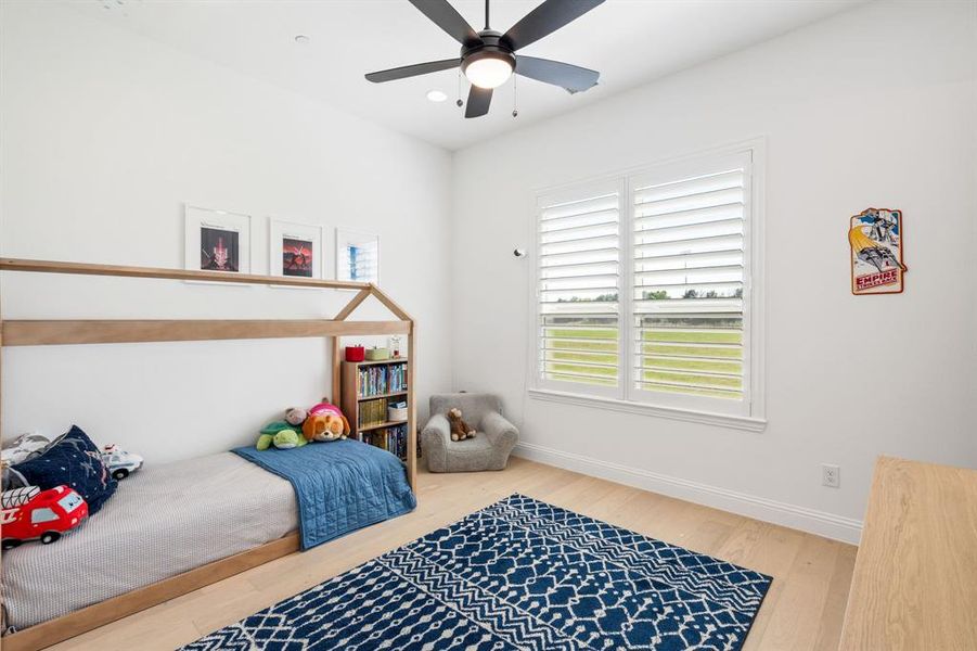 Light and bright bedroom 4 with ensuite bathroom and walk-in closet.