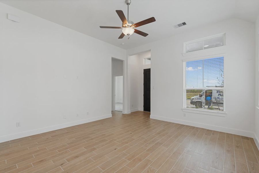 Representative unfurnished interior of a home built from the Torrey Pines by Chesmar Homes in Riceland Alley Loads, Mont Belvieu (Image 14).