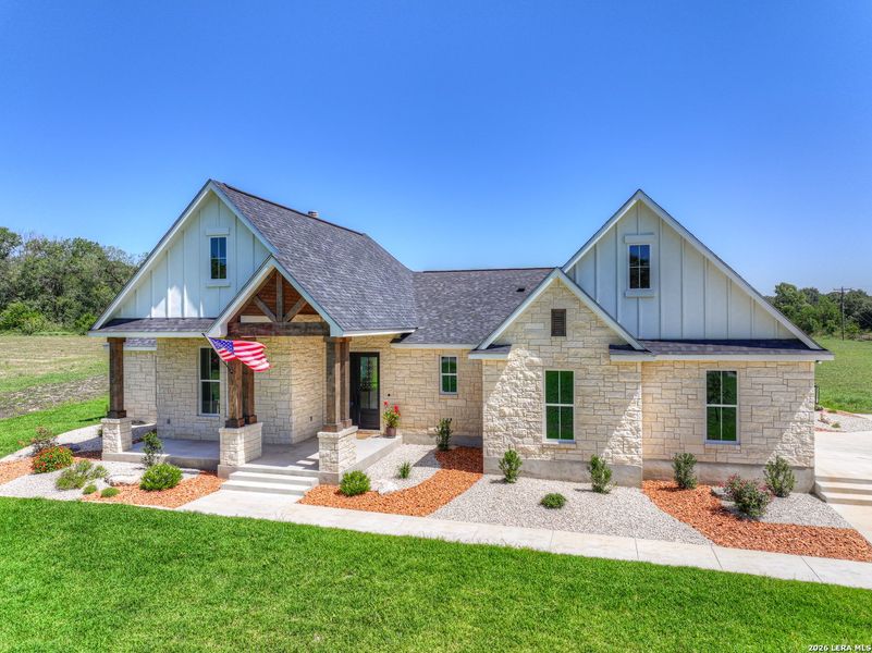 Front exterior of a new home in , Seguin, TX, highlighting curb appeal (Image 30).