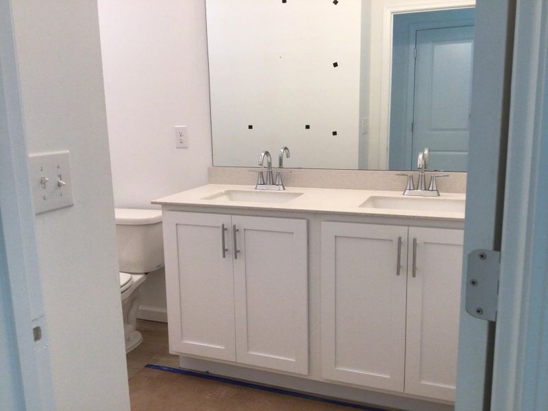 Bath 2 featuring the AW Collection® Coastal - Bright with white cabinets and quartz countertops.