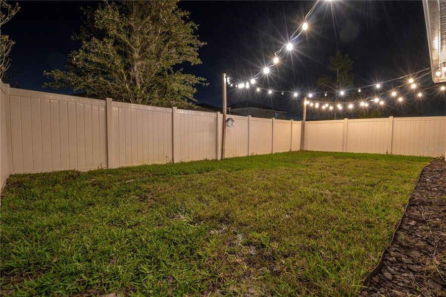 Exterior details and patio area of a home in Canopy Terrace, Deland (Image 4).