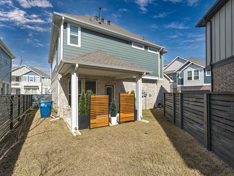 Exterior details and patio area of a home in Bridgeland, Cypress (Image 22). Exterior details and patio area of a home in Bridgeland, Cypress (Image 22).