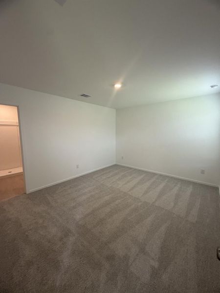 Spacious, unfurnished interior of a new home in Sweetgrass Village, Crosby (Image 22).