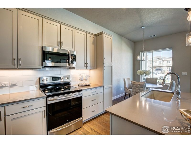 Furnished interior view inside a new home in Highlands at Fox Hill - Discovery, Longmont (Image 9).