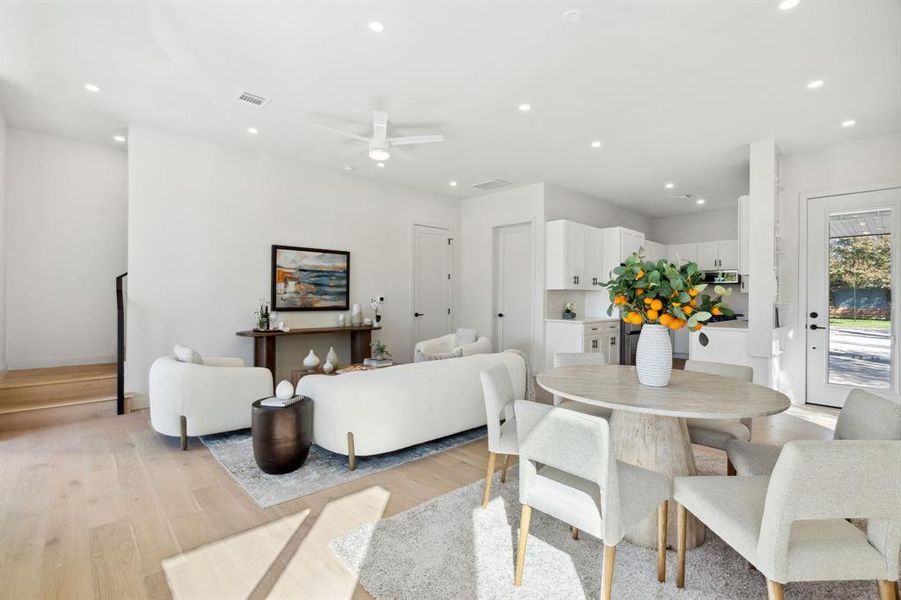 Dining space featuring light wood-type flooring, recessed lighting, and a ceiling fan